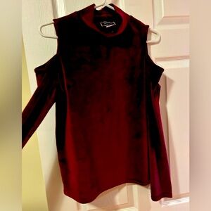 Women’s size medium burgandy velvet top brand is another story